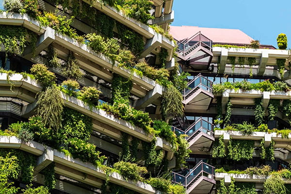 Sustainable Barcelona cityscape with green parks and urban buildings