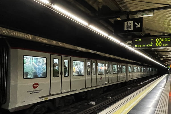Barcelona metro train arriving at station
